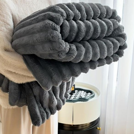 Experience the pinnacle of luxury with the Veluxe Plush Throw, a blanket that redefines softness and warmth. Designed for those who cherish comfort and elegance, this plush throw is crafted from premium, ultra-soft materials, making it the perfect addition to your home. Whether you're looking to enhance your living room décor or cozy up in your bedroom, the Veluxe Plush Throw is the ideal choice.